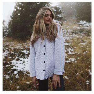 White quilted button-up jacket